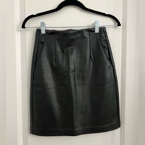 Black leather mini skirt